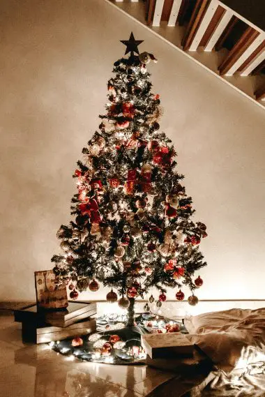 A Christmas tree featuring a wide variety of decorative elements.