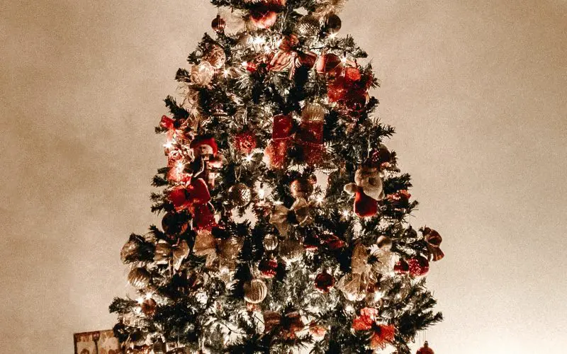 A Christmas tree featuring a wide variety of decorative elements.