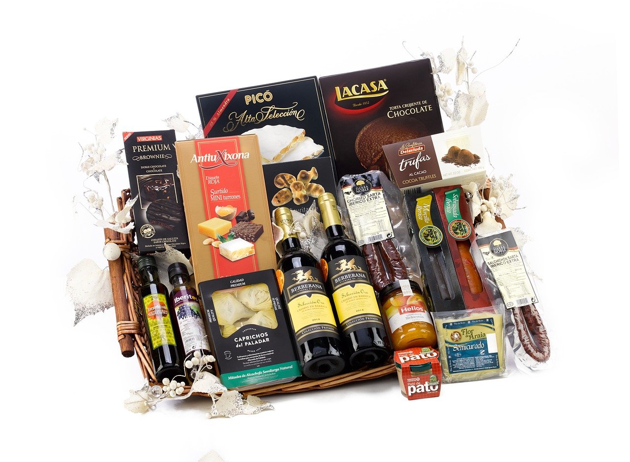 Gift hamper featuring a number of different items A gift hamper with a wide variety of different treats and goodies