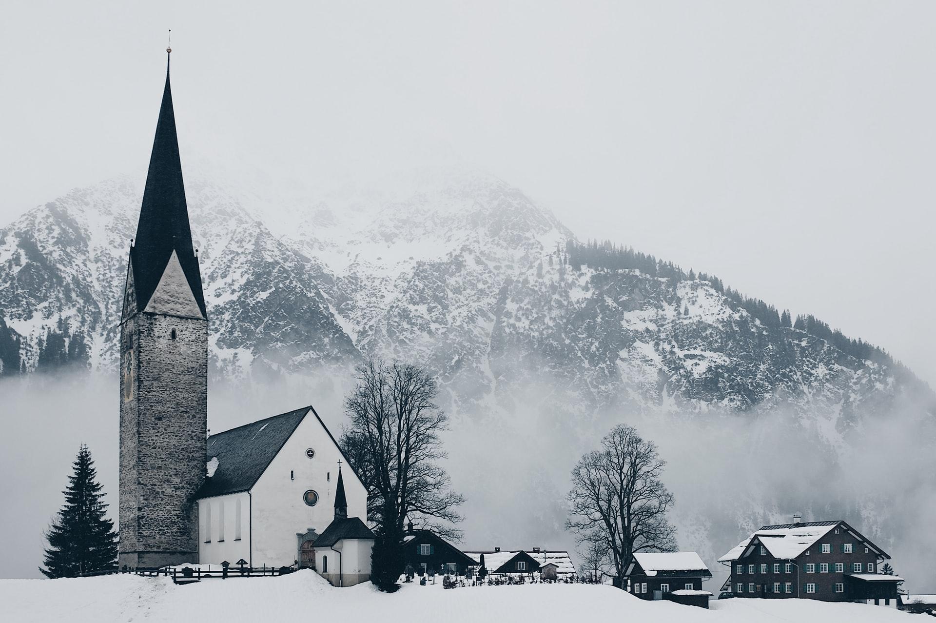 A town near the mountains covered in snow