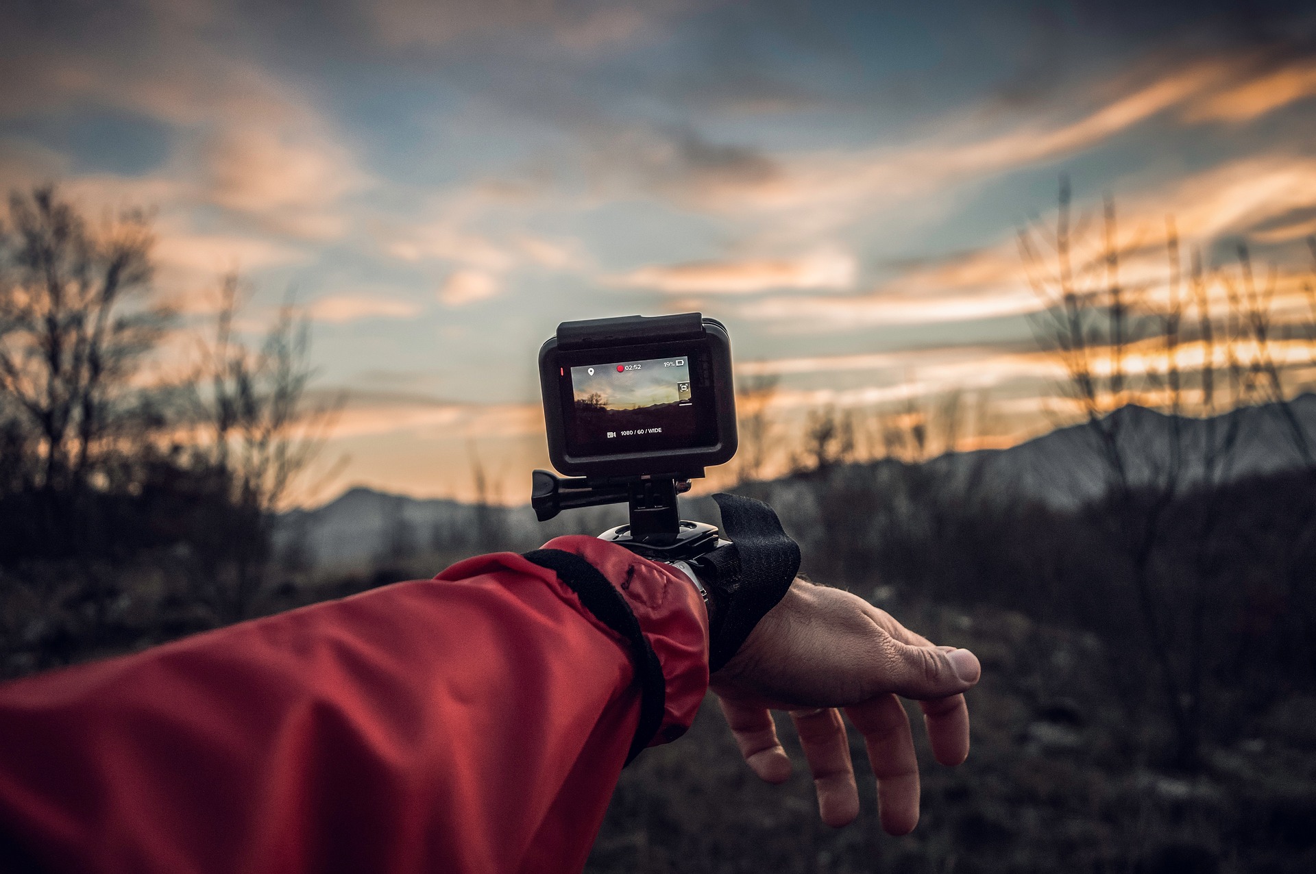 The hand of an athlete wearing a GoPro camera.