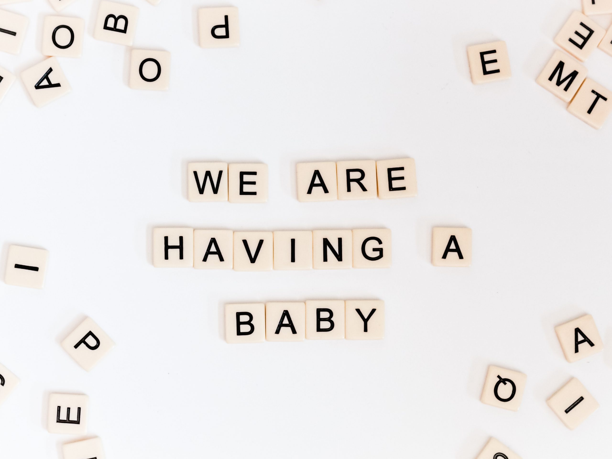 Baby announcement using a word puzzle A baby announcement coming from a couple using a word puzzle