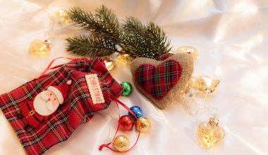 Buffalo plaid checkered Christmas ornaments in different color combinations, including blue, black, red, green, brown, and white and different shapes