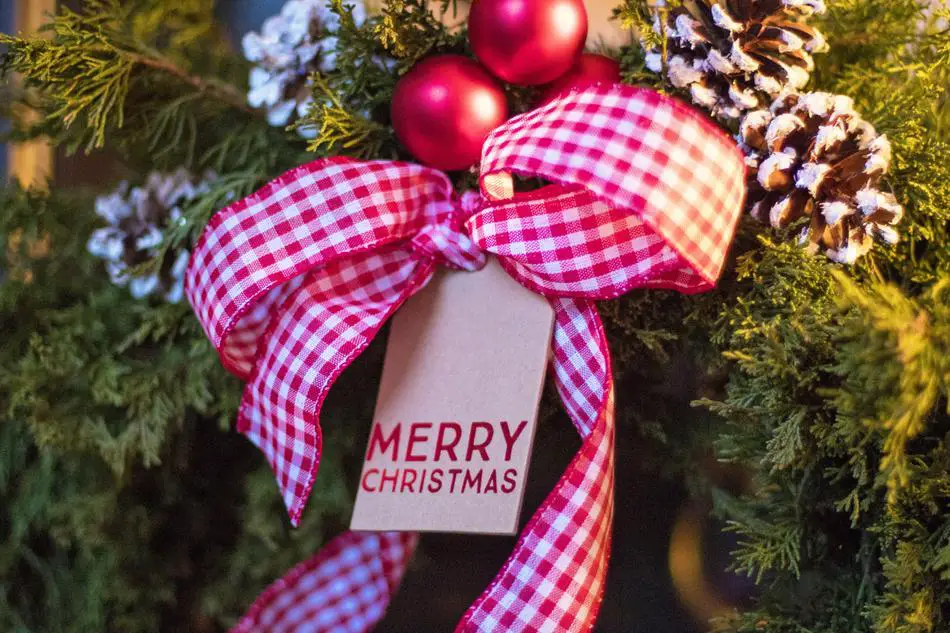 Four checkered buffalo plaid Christmas ribbons in different color combinations 